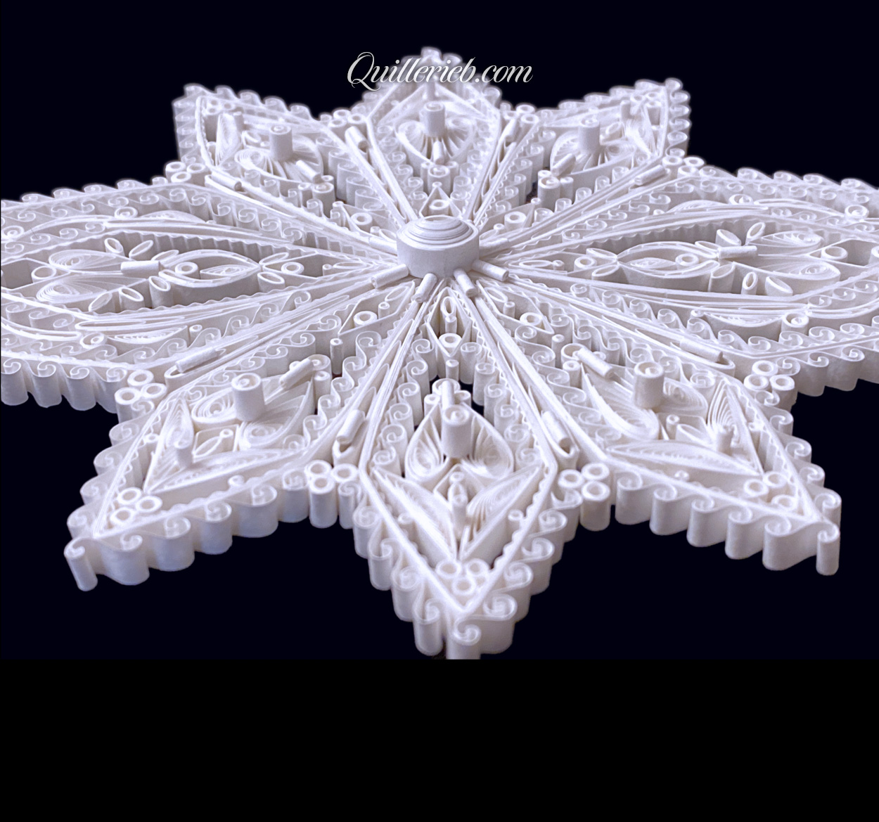 8-Point Star quilling design in brown and white tones full view.