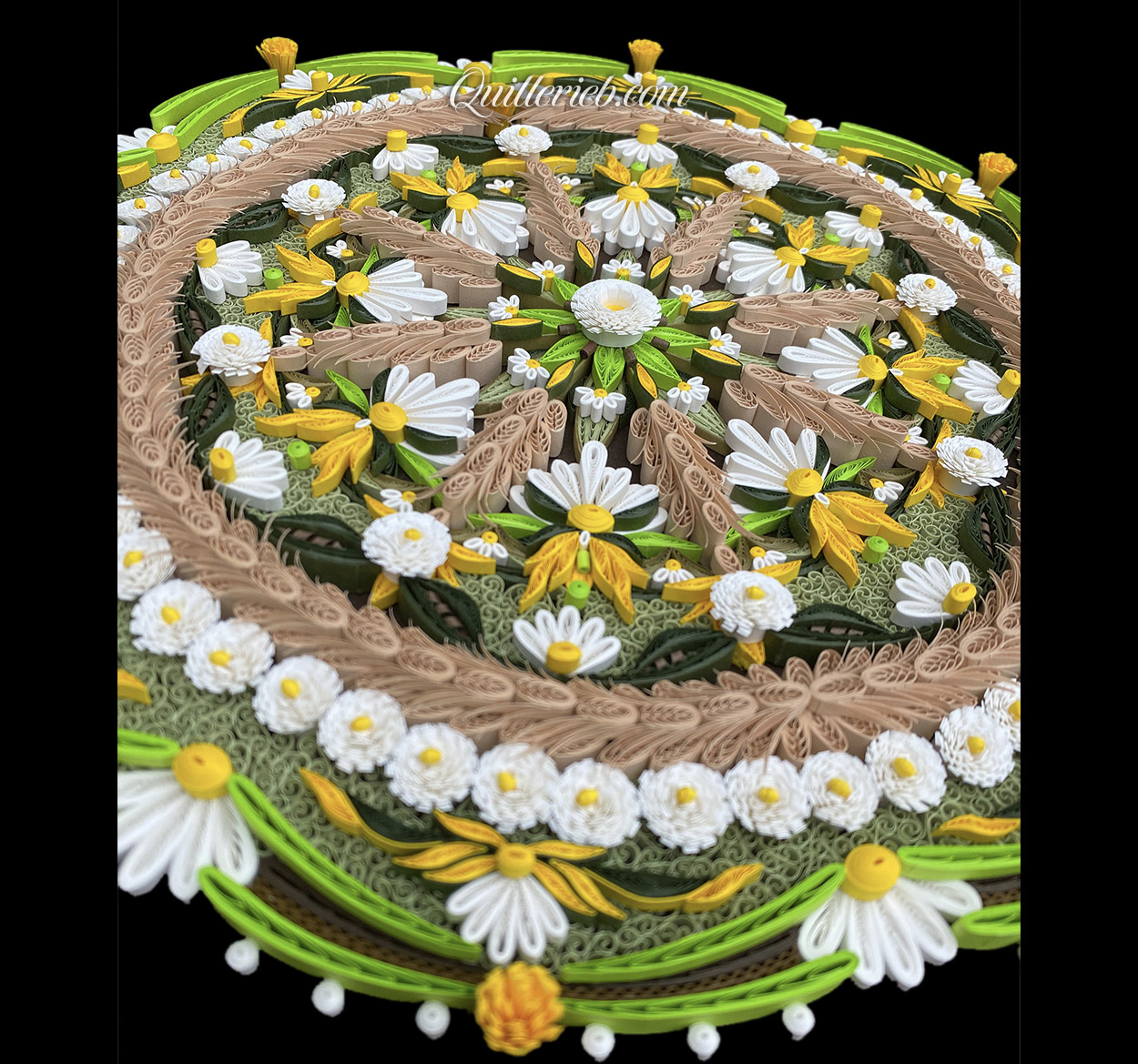 Circular quilling in green, brown, gold and white colors perspective bottom slanted backwards and tilted right view.